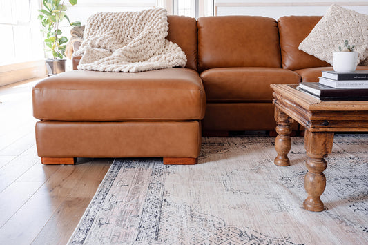 Elevate Your Space: How to Style Your Living Room with the Right Size Rug